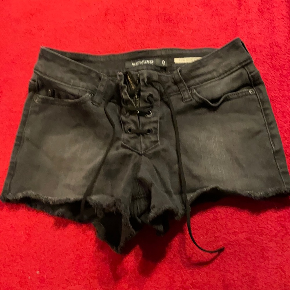 Ladies black denim lace up cut off shorts
